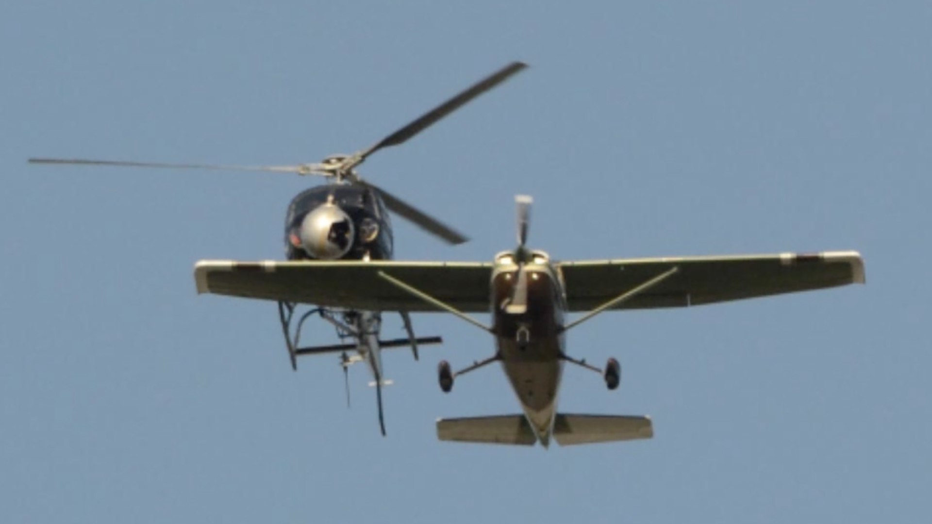 Cinematic flight tracking trailing behind aircraft wings